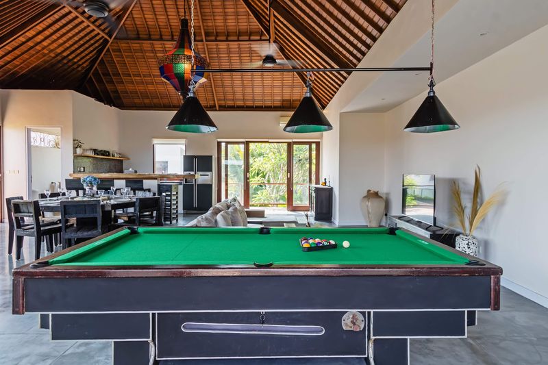 Billiard table beside the upper living area