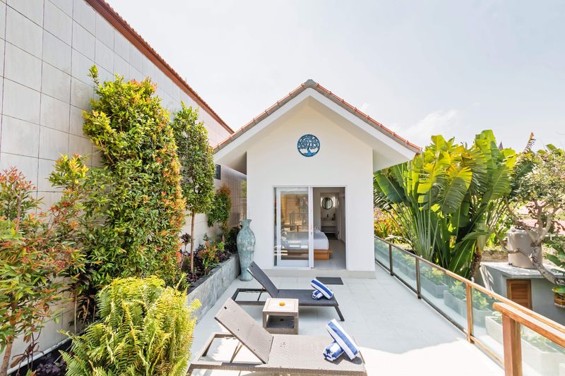 The villa and garden from the pool terrace
